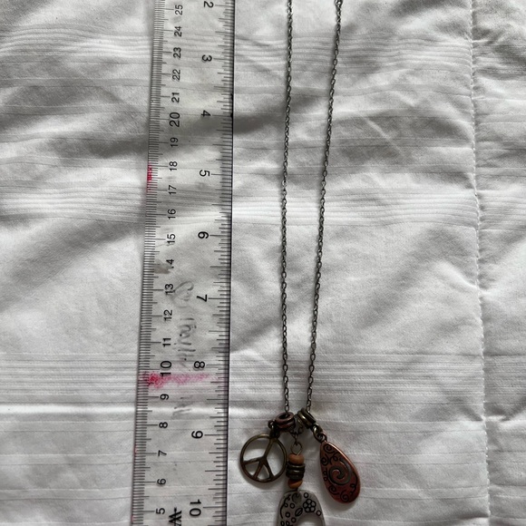 Lia Sophia Silver and Brown Charm Necklace - Picture 2 of 2